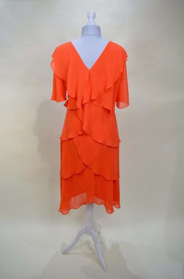 Renta vestido naranja corto